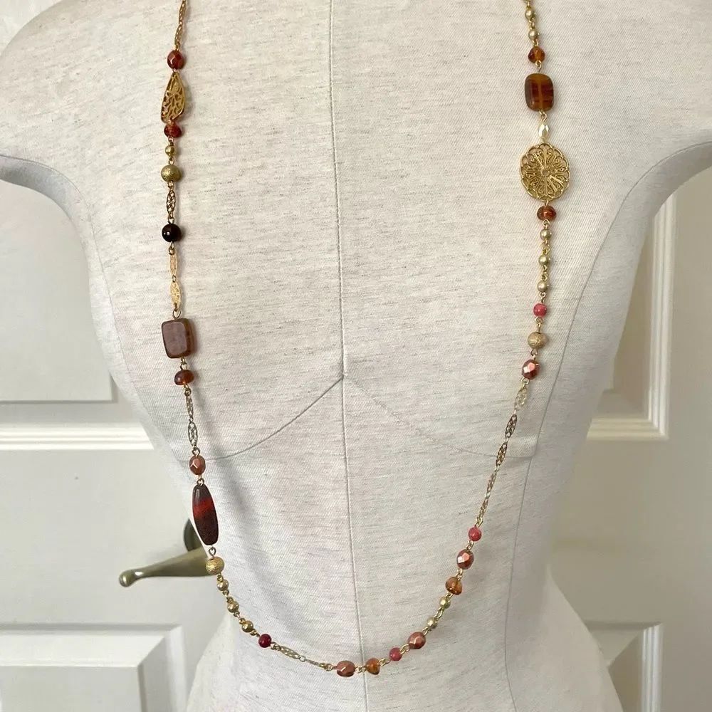 Avon long gold tone beaded necklace